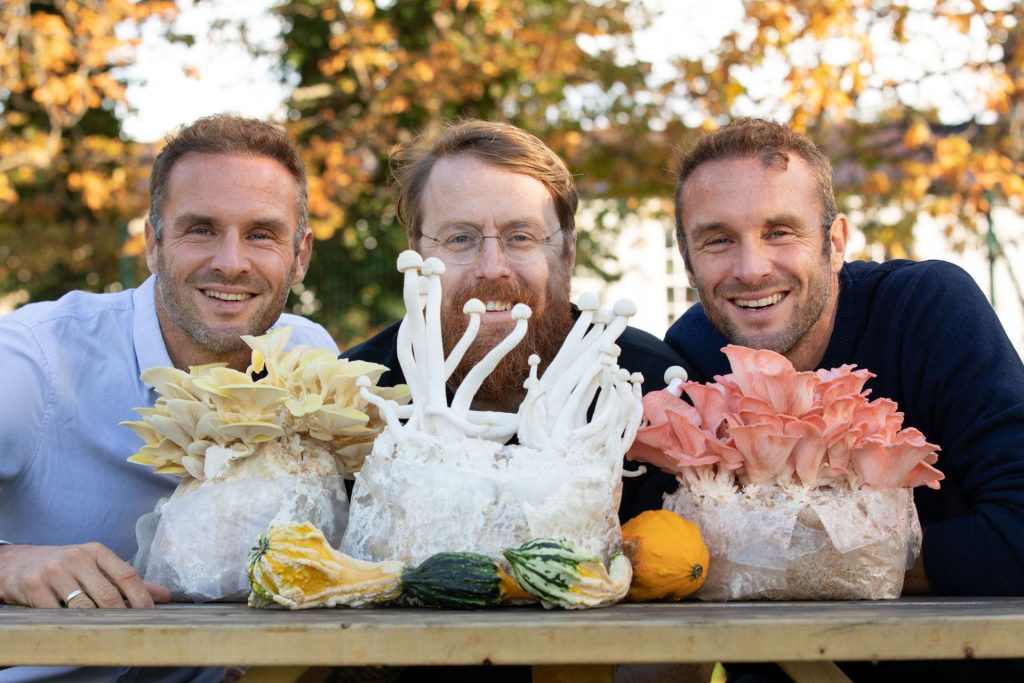 Close up photo of The Happy Pear Stephen and David Flynn with chef JP McMahon leaning in over colourful mushrooms from Garryhinch Wood Exotic Mushrooms Events & Press/PR Photographers Dublin